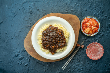 Jajangmyeon , Noodles with Black Bean Sauce, Korean-Chinese noodle dish with kimchi.
