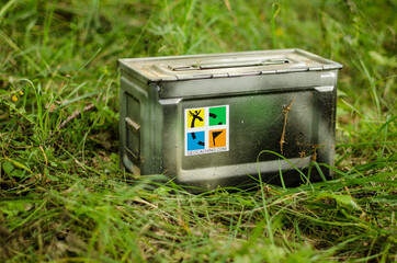 Geocaching ammo box, Kabile, Latvia. © Bargais