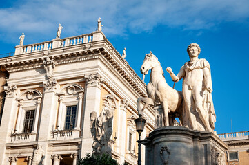 Obraz premium The Statue of Castor (Statua di Castore), a renaissance sculptural work installed at the entrance to Piazza del Campidoglio, on the top of Capitoline Hill in Rome, Italy
