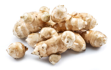 Jerusalem artichoke roots isolated on white background.