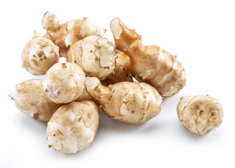Jerusalem artichoke roots isolated on white background.