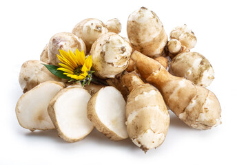 Jerusalem artichoke roots with leaves and flower of Jerusalem artichoke isolated on white background.