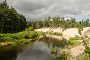 Fototapeta na wymiar Irbe river and beautiful steep banks, Latvia.