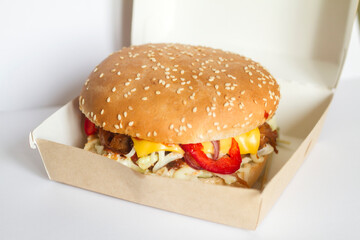 burgers with cutlet, cheese and vegetables