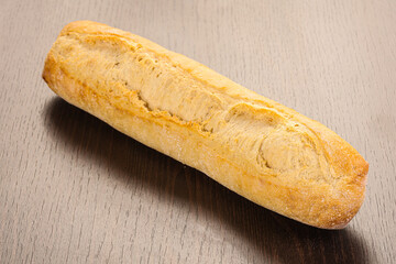 Crust tasty baguette over board