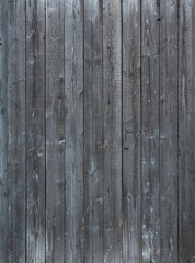 Fototapeta premium dark grey background of vertical wooden old grungy painted planks