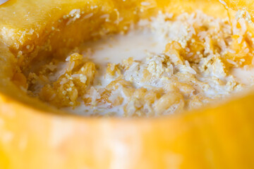 
delicious porridge friendship with rice and millet in a pumpkin in the oven