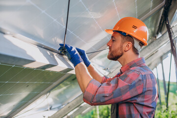 Engineer doing check up in solar panels