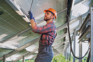 Engineer doing check up in solar panels