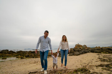 parent and child on beach