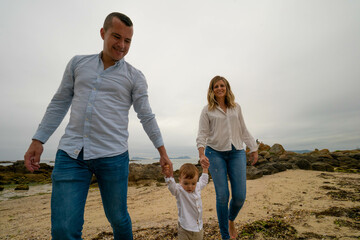 Parent and child on beach