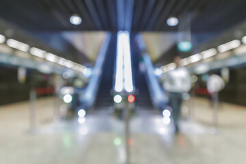 abstract blur and defocused passengers in Hong Kong's subway system for background, old film look effect, Mass Transit Railway, a major public transport network serving Hong Kong