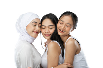 enjoying a veiled girl and two asian young girl hugging with close her eyes in front of camera