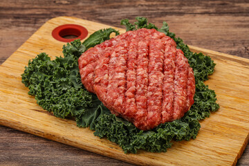 Raw beef burger cutlet for cooking