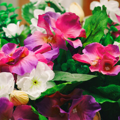 Bouquet of beautiful artificial red and white flowers