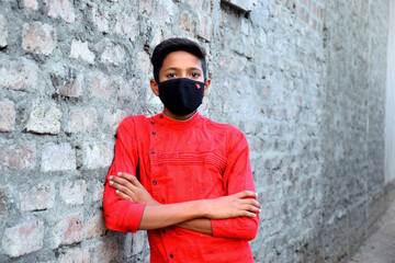 13 years old Asian cute boy wearing protective mask, prevention