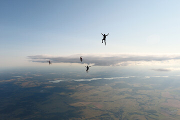 Freefly skydiving. Fun jump. Skydivers are flying in the sky.