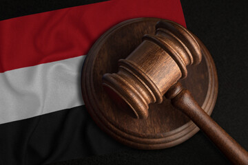 Judge Gavel and flag of Yemen. Law and justice in Republic of Yemen. Violation of rights and freedoms