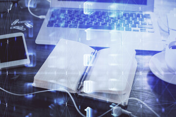 Multi exposure of data theme drawings and desk with open notebook background. Concept of education