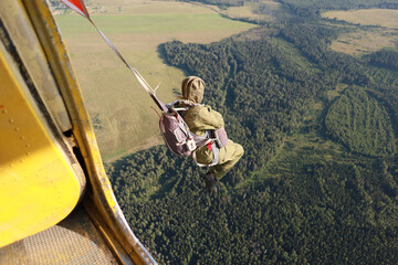 Paratrooper. A jumping out of a plane.