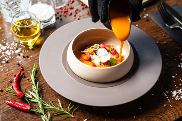 Bouillabaisse, Octopus, blue mussels, tuna, king prawns, Scottish salmon. Delicious healthy French traditional food closeup served for lunch in modern gourmet cuisine restaurant