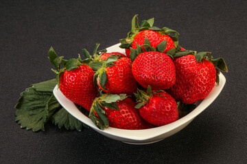 Ripe sweet strawberry with leaf