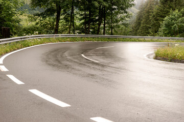 Sharp curve in the mountains after the rain