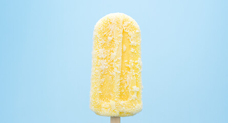 Close-up detail Front view - popsicle stick Yellow isolated on blue background.
