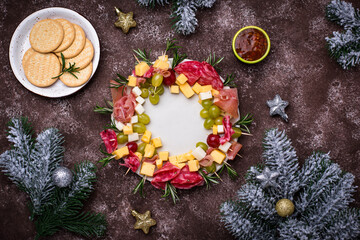 Obraz na płótnie Canvas Appetizers in shape of Christmas wreath