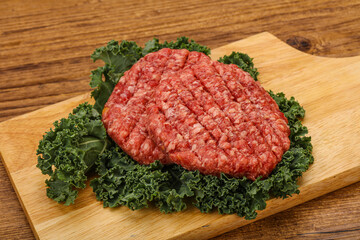 Raw beef burger cutlet for cooking