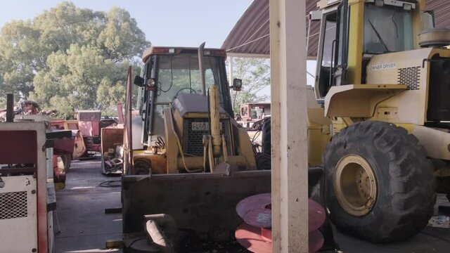 Medium shot broken yellow digger