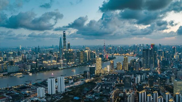 Drone shot: 4K Aerial view of Shanghai skyline in sunny sky.Shoot with Cinema DNG sequence