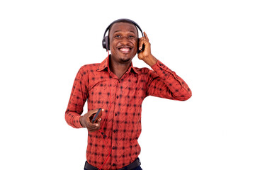 young business man listening to music with headset on mobile phone smiling.