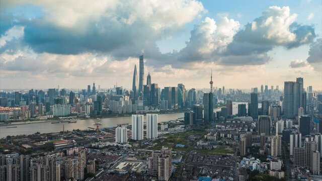 Drone shot: 4K Aerial view of Shanghai skyline in sunny sky.Shoot with Cinema DNG sequence