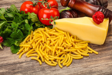 Italian pasta raw Maccheroni for cooking