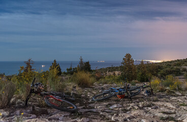Night landscape on a mountain with bikes