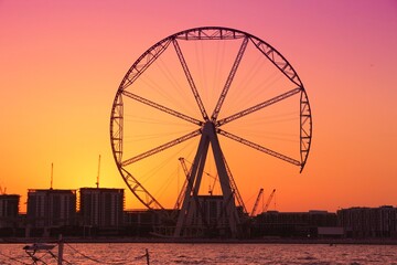 Dubai sunset - ferris wheel construction