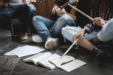 Bandmates rehearsing for their coming gig