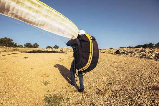 Paraglider is on the paraplane strops - soaring flight moment