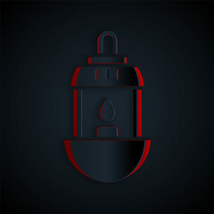 Paper cut Ramadan Kareem lantern icon isolated on black background. Paper art style. Vector Illustration