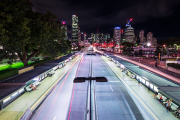 Brisbane Queensland at night with tail lights and road traffic - obrazy, fototapety, plakaty