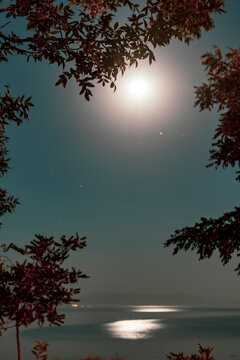 Moon and Yakamoz on Lake Van. low aperture long exposure photography.