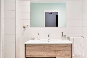 Beautiful and luminous modern bathroom with a minimalist concept