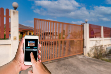 Person used application smartphone on hand control open lock motor automation gate home security...