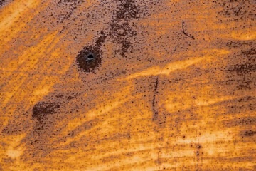 A scratched sheet of old metal surface with a rusty. Abstract vintage background. Rusted iron,...