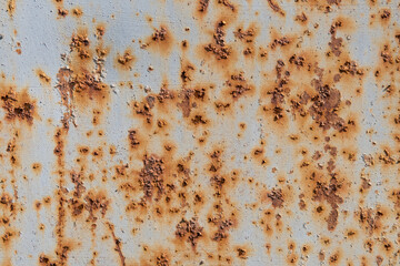 The metal surface starts to rust. Old iron is oxidized in air. Corrosion of metal. Aging of...