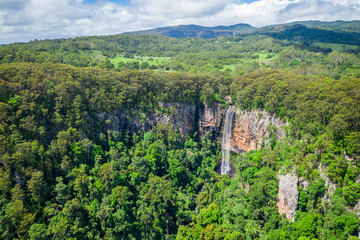 Fototapeta na wymiar Purling Brook Falls in full flow drone aerial photo in Springbrook National Park, Gold Coast, Queensland, Australia