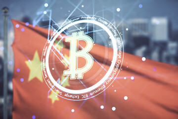 Virtual Bitcoin hologram on flag of China and blurry cityscape background. Multiexposure