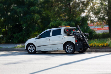 a tow truck parked on the side of the road