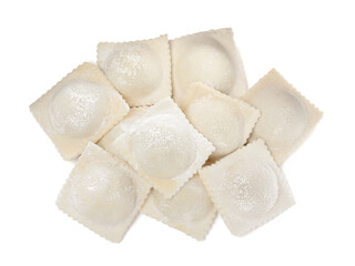 Uncooked ravioli with filling on white background, top view